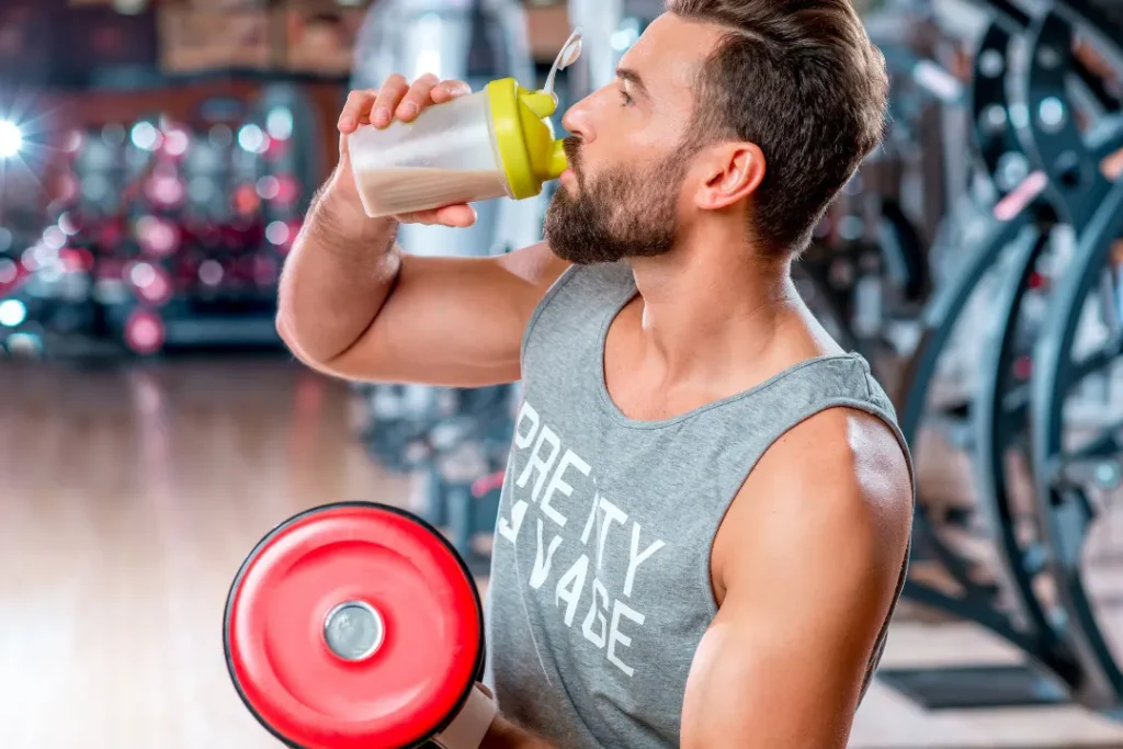 man drinking plant-based protein shakes
