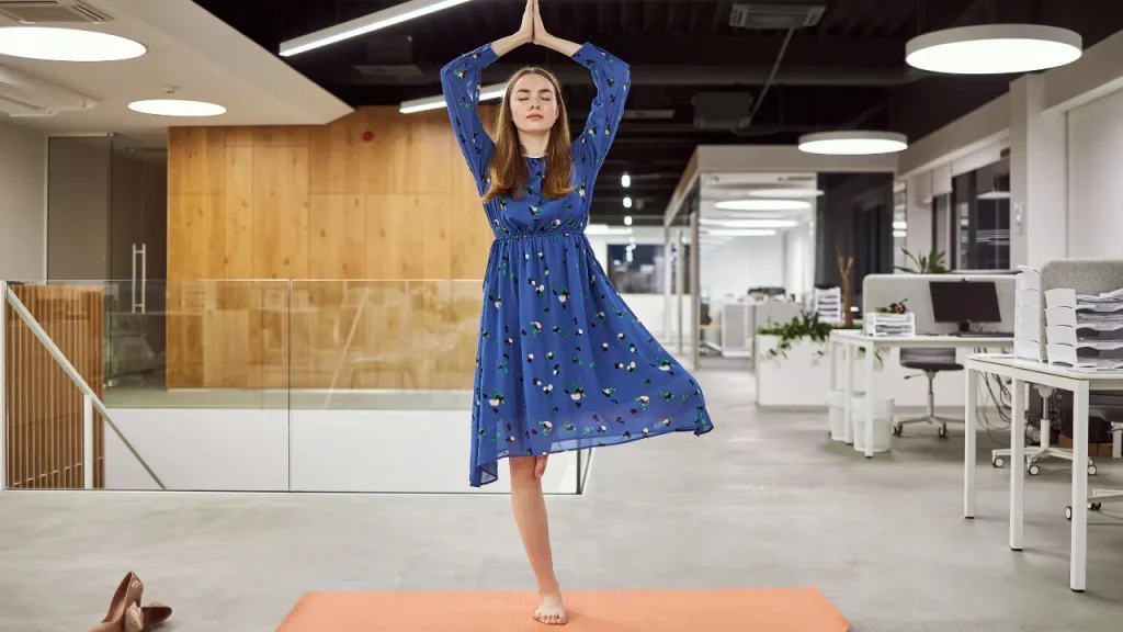 Control IBS Flare-ups With Stress Reduction: Acute Stress vs Chronic Stress in Irritable Bowel Syndrome & 5 Soothing Strategies to Calm Your Gut 4 A lady doing yoga.